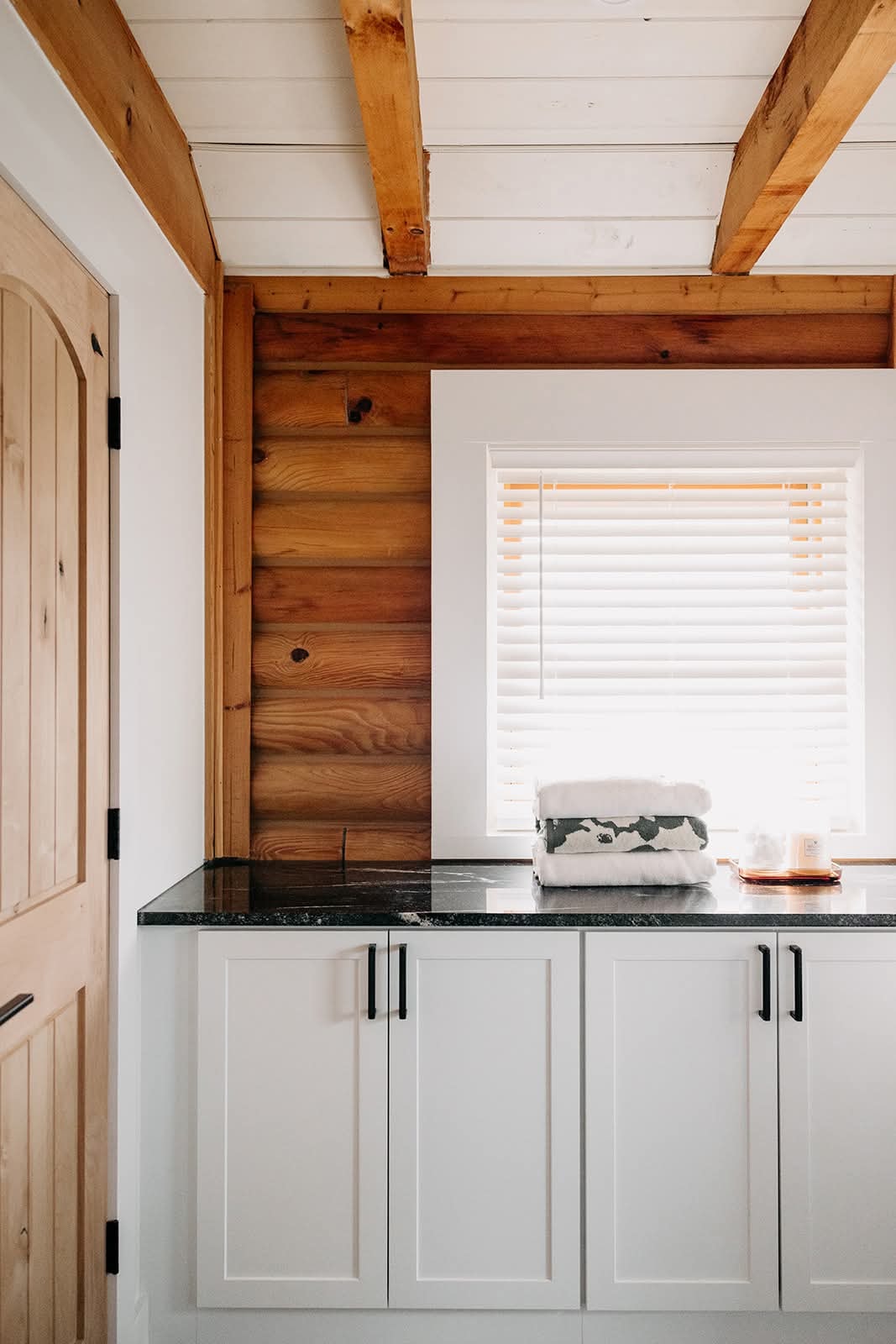 Bathroom renovation with rustic beams by PrestigeCore